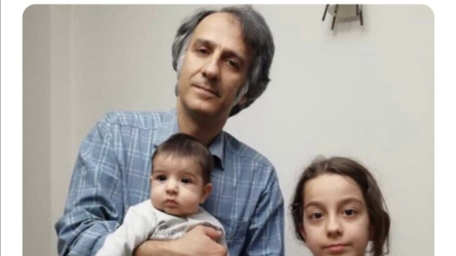 Alireza Alinejad, brother of New York-based VOA Persian TV host Masih Alinejad, with his infant son and daughter prior to his September 2019 arrest by Iranian authorities. (Courtesy Masih Alinejad)