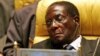 FILE - Zimbabwe's President Robert Gabriel Mugabe closes his eyes during the Africa Union meeting in Sirte, Libya, July 4, 2005. 
