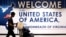 FILE - A man exits the transit area after clearing immigration and customs on arrival at Dulles International Airport in Dulles, Virginia, Sept. 24, 2017. 