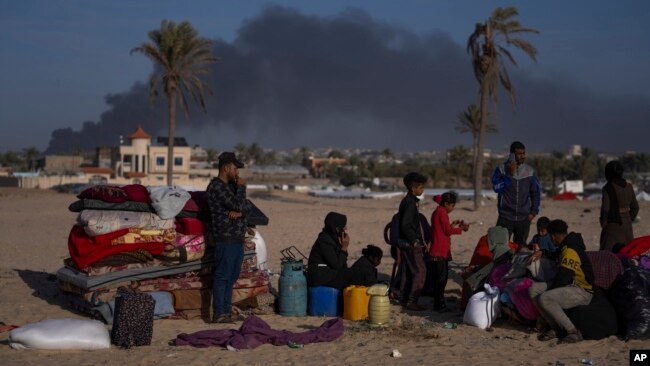 Palestinians who flee from Khan Younis from Israeli ground and air offensive on the Gaza Strip arrive in Rafah, southern Gaza, Jan. 22, 2024.