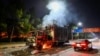 A rally truck used by Bushra Bibi, the wife of Pakistani former Prime Minister Imran Khan, burns near an area that was cordoned off by police after protests to demand Khan's release in Islamabad on Nov. 27, 2024.