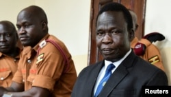 Thomas Kwoyelo, a mid-level commander in the Lord's Resistance Army (LRA) sits in the dock at the International Crimes Division court sitting in Gulu, Uganda, Oct. 25, 2024. 