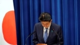 Japanese Prime Minister Shinzo Abe bows during a news conference, where he announced he will resign over health problems, at the prime minister's official residence in Tokyo, Japan.