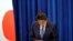 Japanese Prime Minister Shinzo Abe bows during a news conference, where he announced he will resign over health problems, at the prime minister's official residence in Tokyo, Japan.