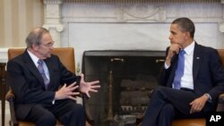 President Barack Obama meets with Sudan Special Envoy Ambassador Princeton Lyman in the Oval Office, April 1, 2011.