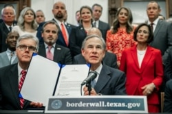 Gov. Greg Abbott speaks during a press conference on details of his plan for Texas to build a border wall and provide $250 million in state funds as a "down payment.", June 16, 2021 in Austin, Texas.