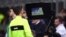 L'arbitre Gianluca Rocchi regarde l'écran du système d'assistant vidéo assistant (VAR) lors d'un match entre l'Inter de Milan et la Lazio à Milan, le 30 décembre 2017.