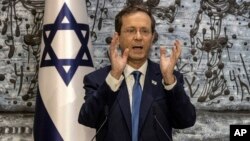 FILE - Israel's President Isaac Herzog speaks at the president's residence in Jerusalem, July 7, 2021. Israel's figurehead president will make the first visit to the United Arab Emirates by the country's head of state next Sunday, his office said.