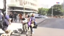 Բեյրութի Թայունե թաղամասից ընտանիքը փախչում է ինտենսիվ հրաձգության բախումների ժամանակ