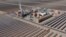 FILE - An aerial view of the solar mirrors at the Noor 1 Concentrated Solar Power plant, 20Km (12.5 miles) outside the central Moroccan town of Ouarzazate on February 4, 2016. Morocco plans to become a top player in creating "green hydrogen," made without burning fossil fuels.