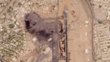 This satellite photo from Planet Labs PBC shows damaged aircraft, including one on fire, at Khartoum International Airport in Khartoum, Sudan, Monday, April 17, 2023. 