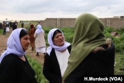 Asia, 16, offers hope for the loved ones of other missing Yazidi girls, just days after being released from five years of enslavement at the hands of IS militants, in Kocho, Iraq, March 15, 2019. She asked that her face not be revealed.