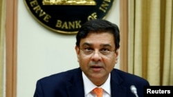 FILE - The Reserve Bank of India (RBI) Governor Urjit Patel attends a news conference in Mumbai, India, Dec. 6, 2017. 