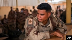 FILE - In this June 9, 2021, photo, French Barkhane force soldiers who wrapped up a four-month tour of duty in the Sahel leave their base in Gao, Mali. 