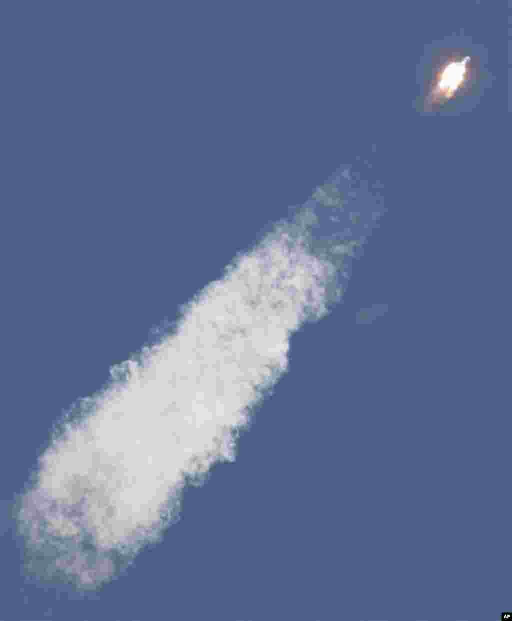 The Soyuz-FG rocket booster with a Soyuz TMA-04M spaceship carrying a new crew to the International Space Station, ISS, blasts off from the Russian leased Baikonur cosmodrome, in Kazakhstan, Tuesday, May 15, 2012. The Russian rocket is carrying U.S. astro