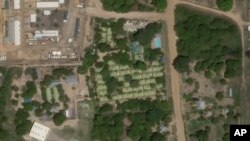 This satellite photo from Planet Labs Inc. shows the Amarula Palma hotel, center, in Palma, Mozambique, Jan. 7, 2021. Since March 29, 2021, the hotel has been empty as fierce fighting for control of Mozambique's strategic northern town of Palma persisted.