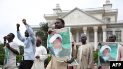 Hundreds of Shi'ites demonstrate in Abuja, on July 10, 2019, to demand the release of the leader of the Islamic Movement in Nigeria (IMN) Sheikh Ibrahim Zakzaky, a day after clashes with police.