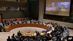 The U.N. Security Council votes on a resolution concerning Somalia, March 23, 2017. President Mohamed Abdullahi Mohamed addressed the council via a video link from Nairobi.