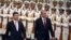 Turkey's President Recep Tayyip Erdogan, right, and his Chinese President Xi Jinping inspect honor guards during a welcoming ceremony outside the Great Hall of the People in Beijing, July 29, 2015.