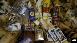 FILE - Illegally trafficked animal products are displayed in a warehouse at the National Wildlife Property Repository in Commerce City, Colo., Oct. 20, 2015.