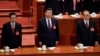 Former presidents Jiang Zemin and Hu Jintao sing the national anthem next to China's President Xi Jinping during the opening of the 19th National Congress of the Communist Party of China at the Great Hall of the People in Beijing, China October 18, 2017. 