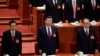 Former presidents Jiang Zemin and Hu Jintao sing the national anthem next to China's President Xi Jinping during the opening of the 19th National Congress of the Communist Party of China at the Great Hall of the People in Beijing, China October 18, 2017. 