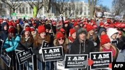 FILE - Anti-abortion demonstrators rally during an annual March of Life on the National Mall in Washington, D.C., Jan. 22, 2014.