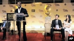 Actor Blair Underwood, left, announces nominations for the 68th Annual Golden Globe Awards as fellow presenters Josh Duhamel, second from right, and Katie Holmes look on in Beverly Hills, California, USA, 14 Dec 2010