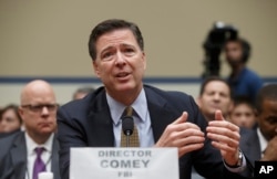 FILE - FBI Director James Comey testifies on Capitol Hill in Washington, July 7, 2016, before the House Oversight Committee to explain his agency's recommendation to not prosecute Hillary Clinton.