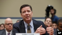 FBI Director James Comey testifies on Capitol Hill in Washington, July 7, 2016, before the House Oversight Committee to explain his agency's recommendation to not prosecute Hillary Clinton.