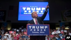 Republican presidential candidate Donald Trump points to the crowd as he speaks during a campaign rally, July 27, 2016, in Toledo, Ohio.