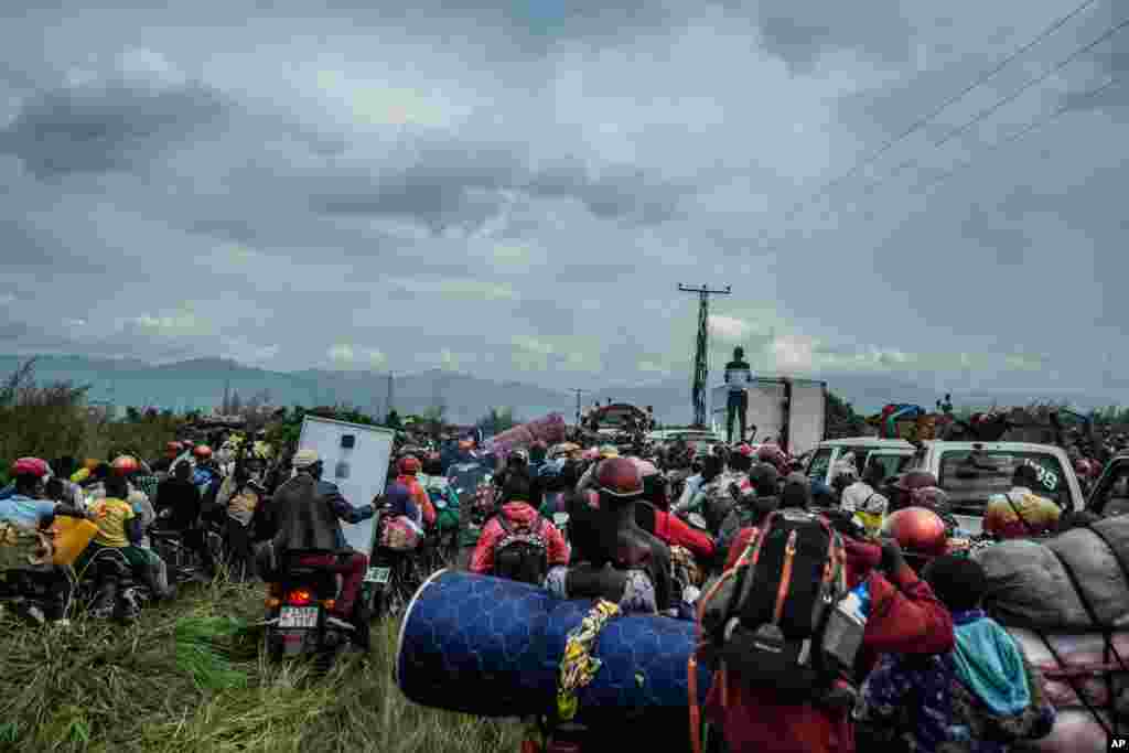 Residents flee Goma, Democratic Republic of Congo, after the military governor of North Kivu province issued an evacuation order because of the risk of the eruption of the Mount Nyiragongo.