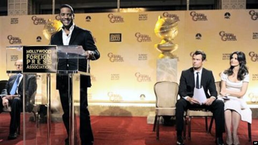 Actor Blair Underwood, left, announces nominations for the 68th Annual Golden Globe Awards as fellow presenters Josh Duhamel, second from right, and Katie Holmes look on in Beverly Hills, California, USA, 14 Dec 2010