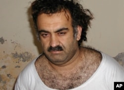 FILE - Khalid Sheikh Mohammed, the alleged Sept. 11 mastermind, is shown on March 1, 2003, shortly after his capture during a raid in Pakistan.