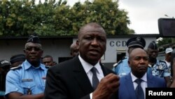 FILE - Hamed Bakayoko, pictured soon after his appointment as Ivory Coast's defense minister, speaks at the National Police Academy in Abidjan, July 20, 2017. Bakayoko, who later became prime minister as well, died of cancer March 11, 2021, at 56.