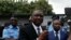FILE - Hamed Bakayoko, pictured soon after his appointment as Ivory Coast's defense minister, speaks at the National Police Academy in Abidjan, July 20, 2017. Bakayoko, who later became prime minister as well, died of cancer March 11, 2021, at 56.