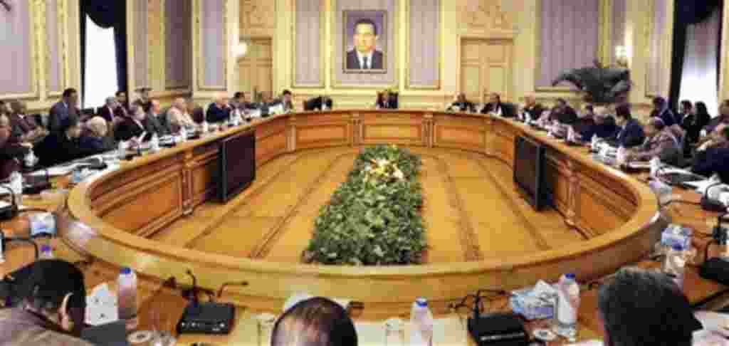 A general view of Egyptian Vice President Omar Suleiman, center back, meeting with leaders of Egyptian parties and the Muslim brotherhood leadership in Cairo, Egypt, Sunday, Feb. 6, 2011