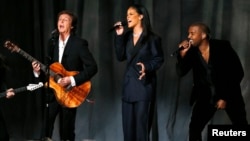 From left, Paul McCartney, Rihanna and Kanye West perform "FourFiveSeconds" at the 57th annual Grammy Awards in Los Angeles, California, Feb. 8, 2015. 