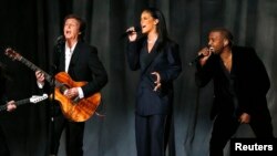 From left, Paul McCartney, Rihanna and Kanye West perform "FourFiveSeconds" at the 57th annual Grammy Awards in Los Angeles, California, Feb. 8, 2015. 