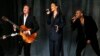 From left, Paul McCartney, Rihanna and Kanye West perform "FourFiveSeconds" at the 57th annual Grammy Awards in Los Angeles, California, Feb. 8, 2015. 