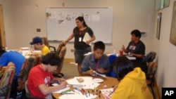 Tribal youth from across the Northwest work on comic book panels on another track of the recent health promotion conference.