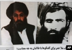 FILE - In this Saturday, Aug. 1, 2015 file photo, an Afghan newspaper shows pictures of the new leader of the Afghan Taliban, Mullah Akhtar Mansoor, left, and former leader Mullah Mohammad Omar, in Kabul, Afghanistan.