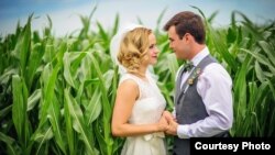 After Michelle Osten and Cody Bakken married on a Minnesota farm, she took his surname. (Megan Sugden Photography)