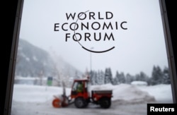A logo is pictured on a window ahead of the World Economic Forum (WEF) annual meeting in the Swiss Alps resort of Davos, Switzerland, Jan. 21, 2018