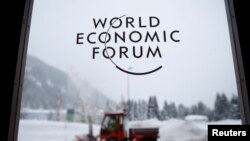 A logo is pictured on a window ahead of the World Economic Forum (WEF) annual meeting in the Swiss Alps resort of Davos, Switzerland, Jan. 21, 2018 