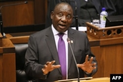 South Africa's President Cyril Ramaphosa delivers his State of the National address at the Parliament in Cape Town, on February 16, 2018.