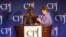 Mae Azango receiving CPJ award from AP Executive Editor Kathleen Carroll 