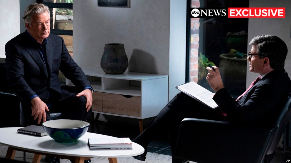 This image released by ABC News shows actor-producer Alec Baldwin, left, during an interview with “Good Morning America” co-anchor George Stephanopoulos. (Jeffrey Neira/ABC News via AP)