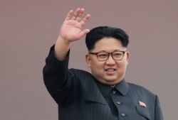 FILE- North Korean leader Kim Jong Un waves at parade participants at the Kim Il Sung Square in Pyongyang, North Korea, May 16, 2016.