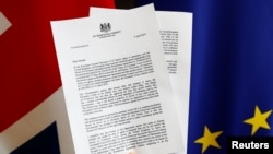 A copy of a letter from Britain's Prime Minister Theresa May, to European Council President, Donald Tusk, regarding Brexit is seen in this picture illustration at the EU Council, April 5, 2019.